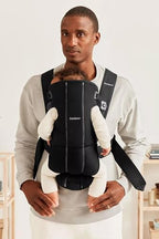 Unclenched front panel mechanism of BabyBjorn newborn carrier for sleeping babies