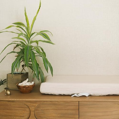 Little Unicorn organic cotton changing pad cover styled on baby nursery furniture