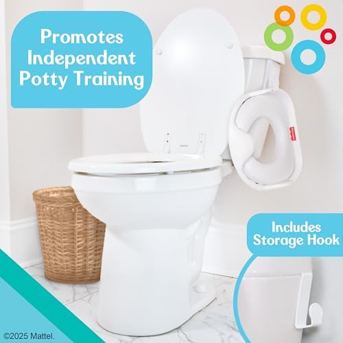 Fisher-Price baby toilet training seat next to the included white storage hook for bathroom organization