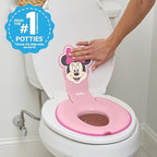 Close up of Bright Starts Disney Baby Minnie Mouse toilet training ring adhesive hinges