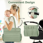 Exterior quick-access tissue pocket in use on the IBFUN mommy bag