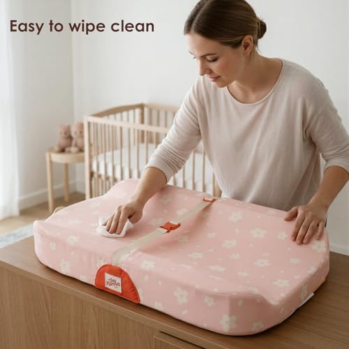 Tiny Marvels nursery changing pad safety strap detail