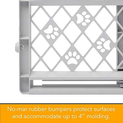 Lightweight expandable pet barrier being adjusted to fit a wide hallway opening without tools.