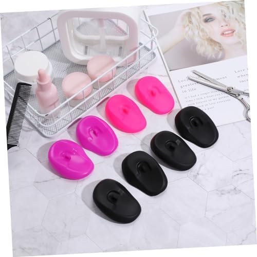 Four pairs of professional hair salon ear covers in packaging