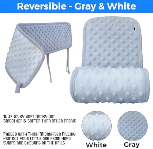 Crib rail cover showing reversible gray side on baby bed