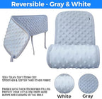 Crib rail cover showing reversible gray side on baby bed