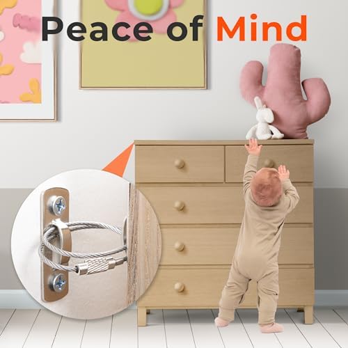 Close-up view of the heavy-duty child safety wall anchor attached to a wooden dresser frame.