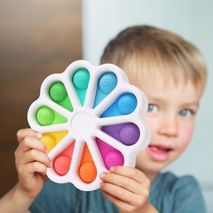 AFLUODN preschool learning tool being held by a toddler to practice finger coordination and fine motor skills.