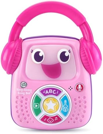 Toddler holding the headphone shaped handle of the pink song bot