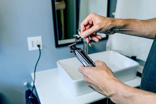 Andis imported hair trimmer kit attachment combs and barber tools laid out for maintenance