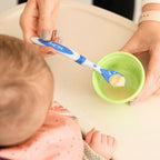 Nuby baby feeding spoons showing the extended long handle design for deep jars.