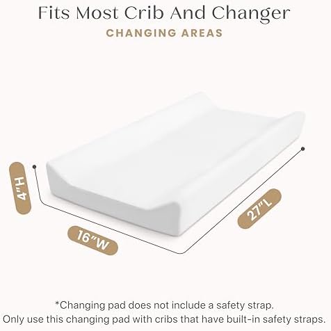 Contoured changing pad edges and safety strap opening