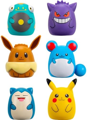 Close up of one inch Pikachu and Gengar miniature squishy toys