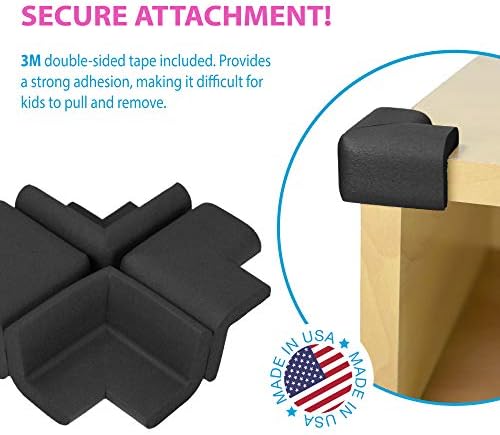 KidKusion black foam corner protector applied to wooden furniture edge