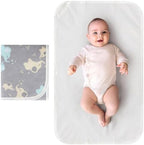 Accmor travel baby mat unfolded on a surface displaying the waterproof cotton material