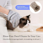 Diluting Muddi Pet dry cat shampoo capsule in warm water