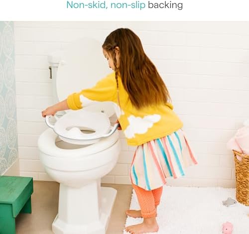 Munchkin comfortable kids toilet trainer seat with integrated splash guard for boys and girls.
