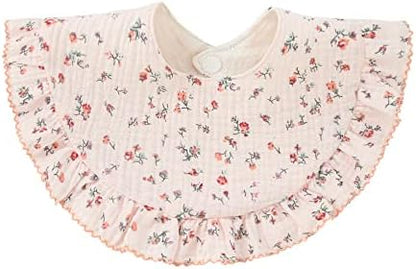 Baby wearing Nishine 360 degree rotating muslin bandana bib