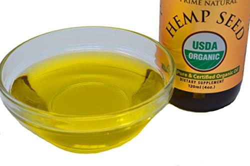 Prime Natural organic hemp seed oil texture poured on skin
