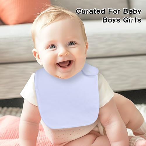 Group of 8 baby bibs for boys and girls arranged neatly