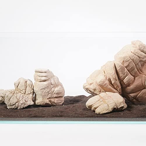 Landen Congo sand paired with driftwood and stones