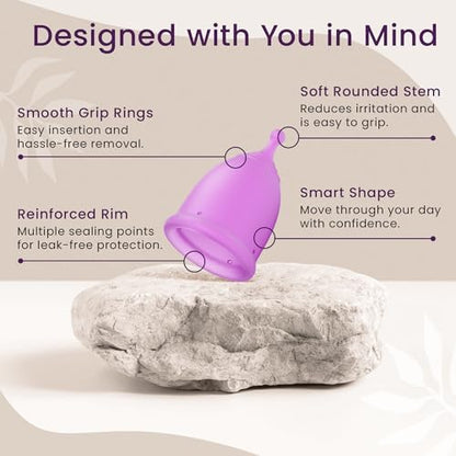 Soft flexible EcoBlossom period cup being held to demonstrate material quality.