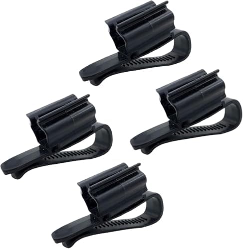 Black fish tank water pipe hose holders stabilizing a filter tube on a glass rim.