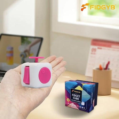 FIDGYB pocket-sized sensory tool displaying the rotating dial and rolling steel ball features