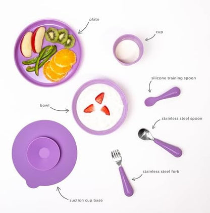 Close up view of the green Ubbi toddler plate and bowl highlighting the high ladle walls