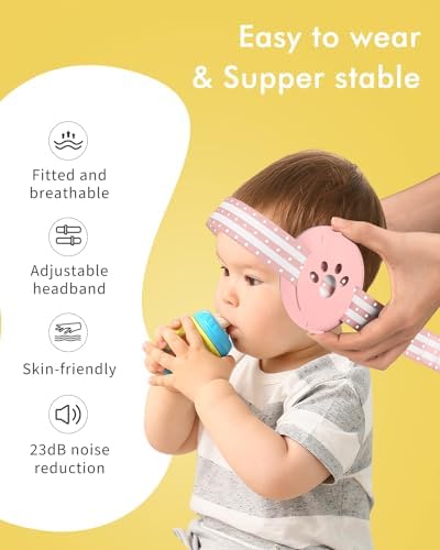 Baby wearing Nectar Baby ear protection on an airplane