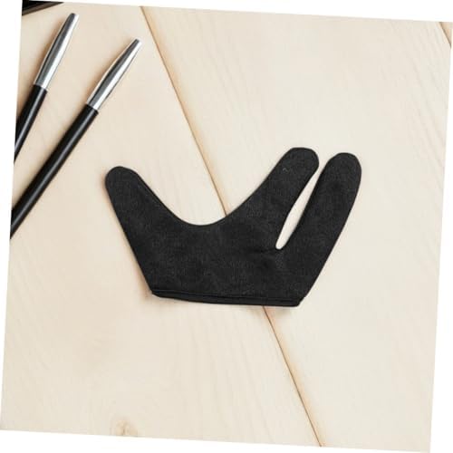 Anti-scald black hairdressing finger sleeves providing heat insulation for safe home hair straightening.