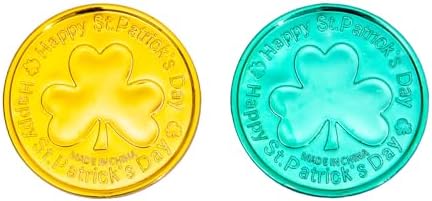 Plastic shamrock leprechaun clover tokens scattered across a festive party table layout