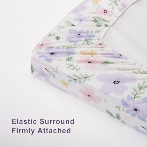 Wrinkle resistant baby changing pad cover set inside a modern nursery setup