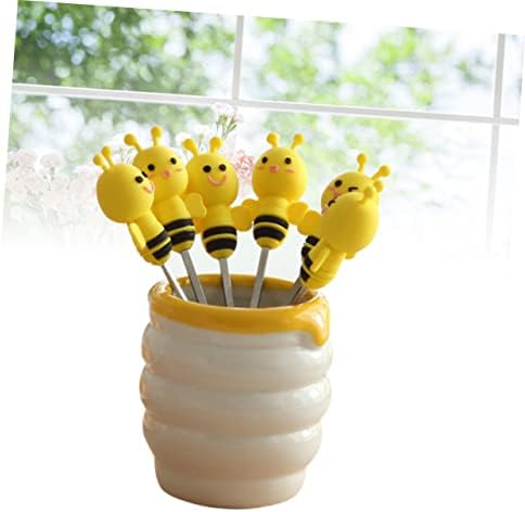 Ceramic beehive holder for fruit forks showing compact design