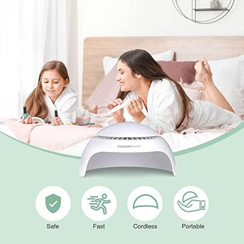 Hand placement inside TOUCHBeauty nail dryer for drying polish
