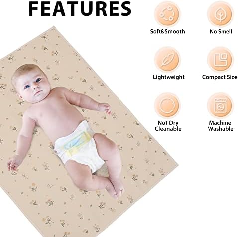 Parent using Phoebus Baby wipeable changing pad