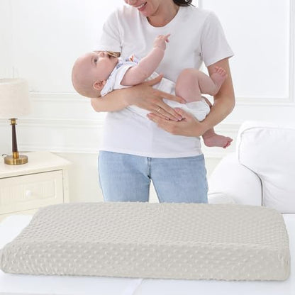 Nivava Baby pad cover with safety strap openings visible
