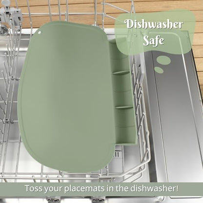Flexible silicone material of a sage green baby dining mat being wiped clean easily.