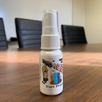 Liquid Ass practical joke spray bottle angled side shot showing fine mist nozzle