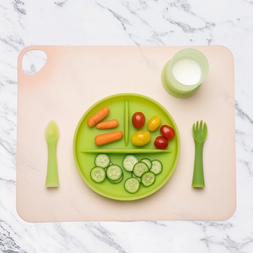 Compact blueberry silicone dining mat for infants next to its portable storage container