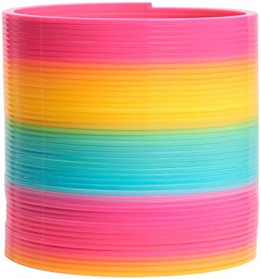 Five inch diameter rainbow slinky walking down indoor stairs