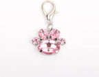 Close up of sparkling rhinestone paw print pet accessory