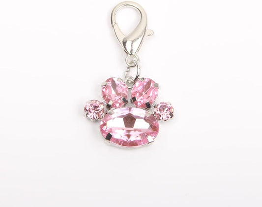 Close up of sparkling rhinestone paw print pet accessory