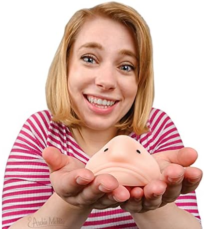 Authentic Archie McPhee Sunny The Blobfish five inch stress relief toy being stretched to demonstrate flexible material.
