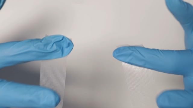 NanaCare first aid bandage tape being removed cleanly from skin without residue