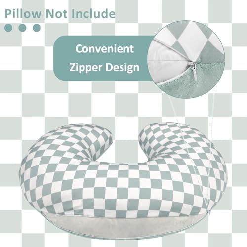 Reversible green checkered nursing pillow cover folded on a nursery chair