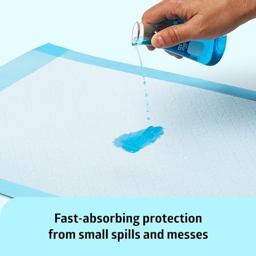Medline absorbent sheet used as a clean puppy training pad on a tiled household floor surface.