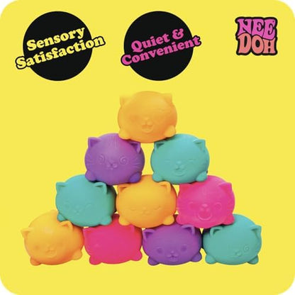 Three mini neon cat shaped squishy fidget toys on a clean surface