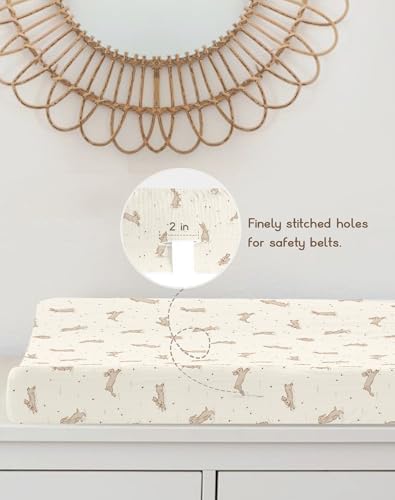 Boho style neutral nursery bedding set featuring rabbit and beige prints