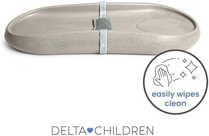 Delta Children baby changing pad featuring elevated sides for safety